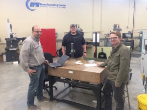 GTC instructor Rich Shouse goes over the day's agenda with China Instrument Parts employees and students Matt Enger and Kent Schopp.