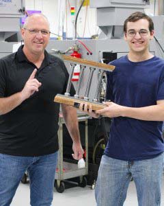 July Pillar Among Peers Recipient, Matt D., pictured with COO Dave Strand