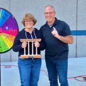 September Pillar Among Peers Recipient, Barb C., pictured with COO Dave Strand